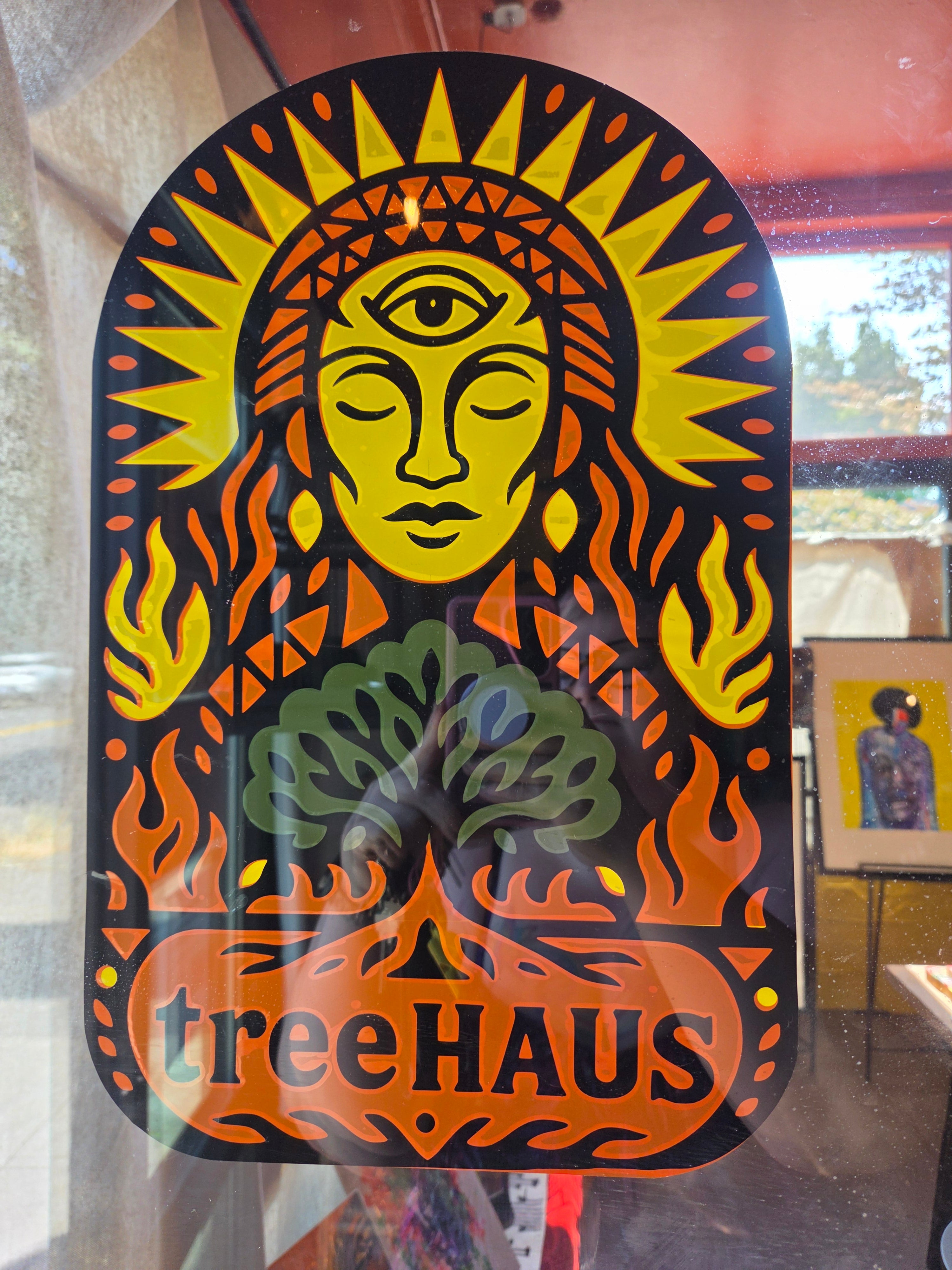Cut-vinyl decal on the treeHAUS gallery door