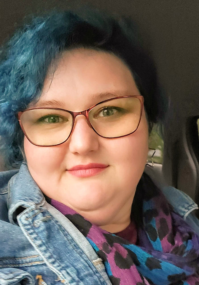 Dori Isakson (they/them)